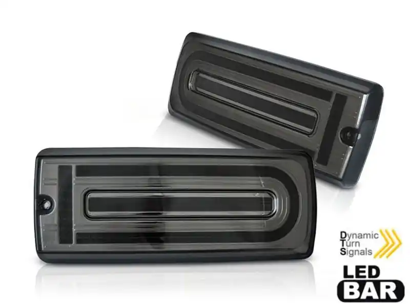 Promoție Set de stopuri LED de tuning potrivit pentru Mercedes G-Class W463 1990-2018 cu bază fumurie, cu semnalizare dinamică, stânga și dreapta
